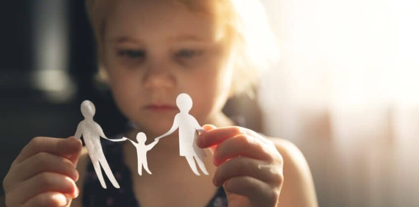 Girl playing with paper family. At What Age Can A Child Refuse To See Their Parent In Australia?